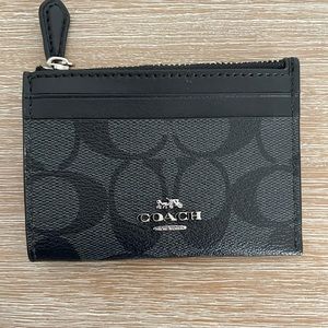COACH  ID CASE IN SIGNATURE CANVAS